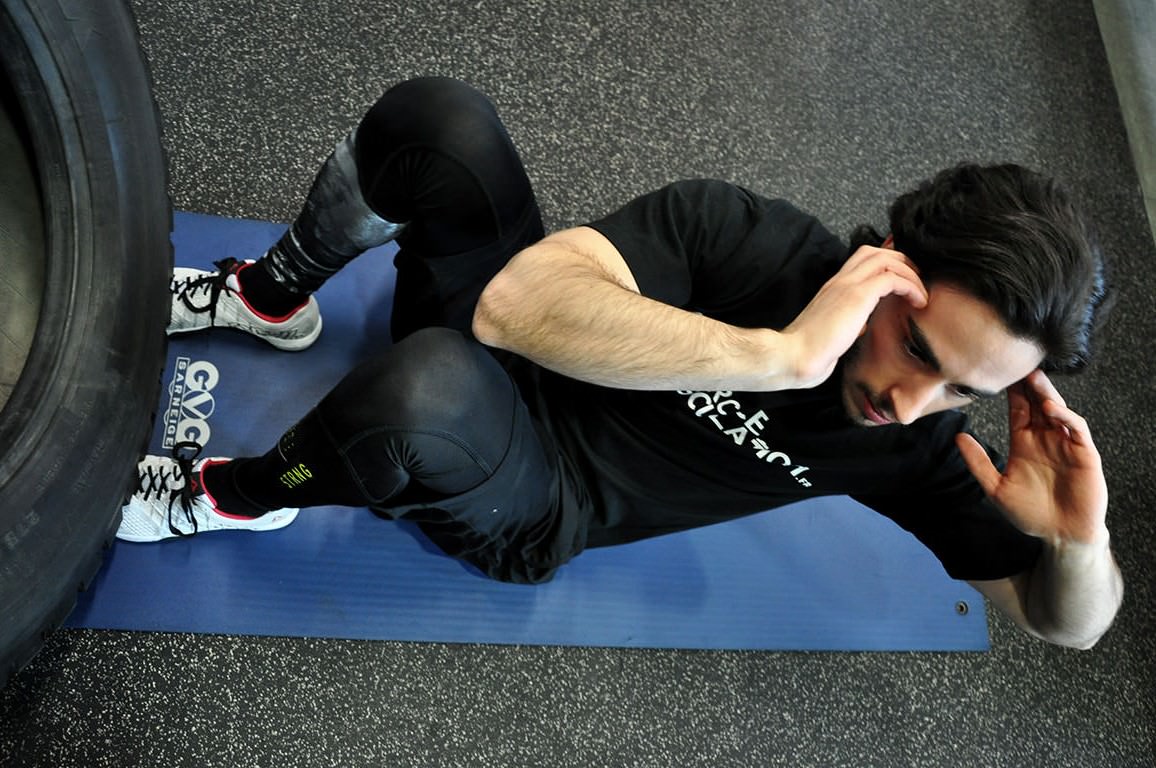 Sit-up avec rotation - Soulever le buste