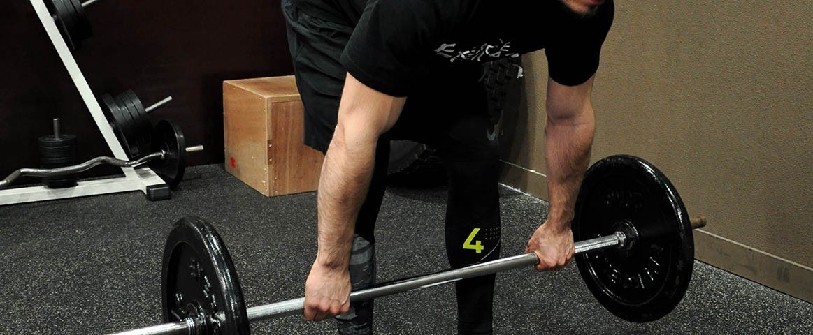 Soulevé de terre jambes tendues - Stiff-legged barbell deadlift